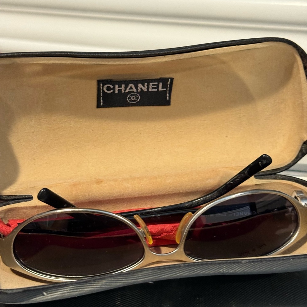 CHANEL Women's Sunglasses in Black and Gold